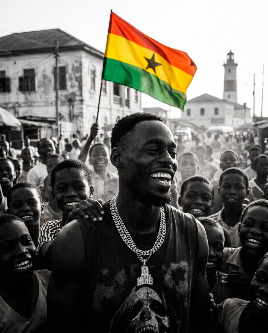 D.King arms spread surrounded by cheering youth under a giant Ghana flag